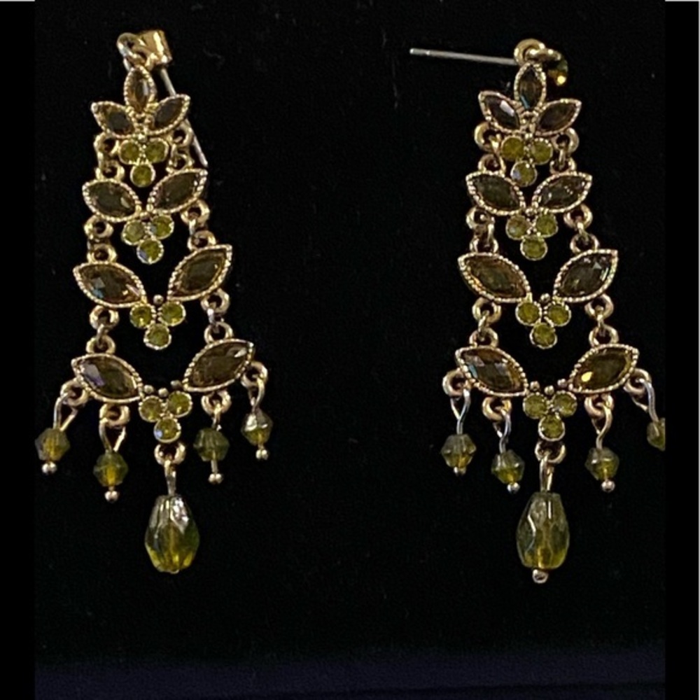 - Stunning gold tone and green stones pierced earring purchased in the 198…